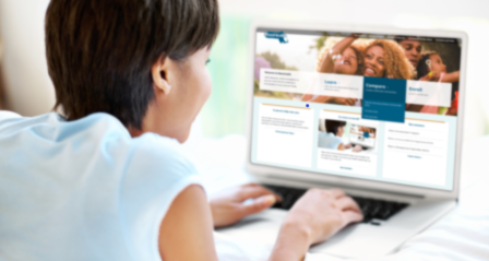 Woman learning about enrollment on a computer
